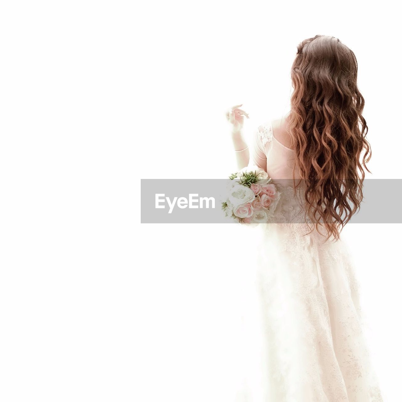 WOMAN LOOKING AWAY OVER WHITE BACKGROUND