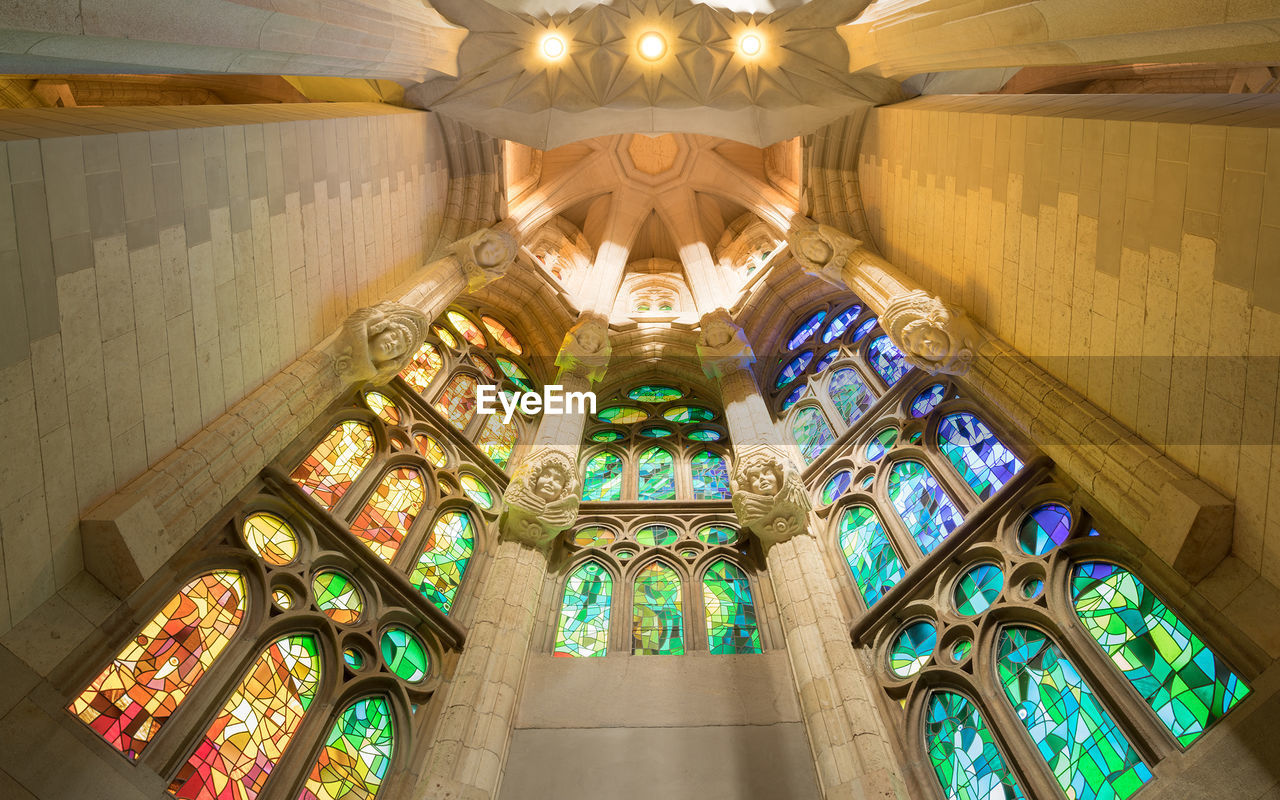 LOW ANGLE VIEW OF ILLUMINATED BUILDING