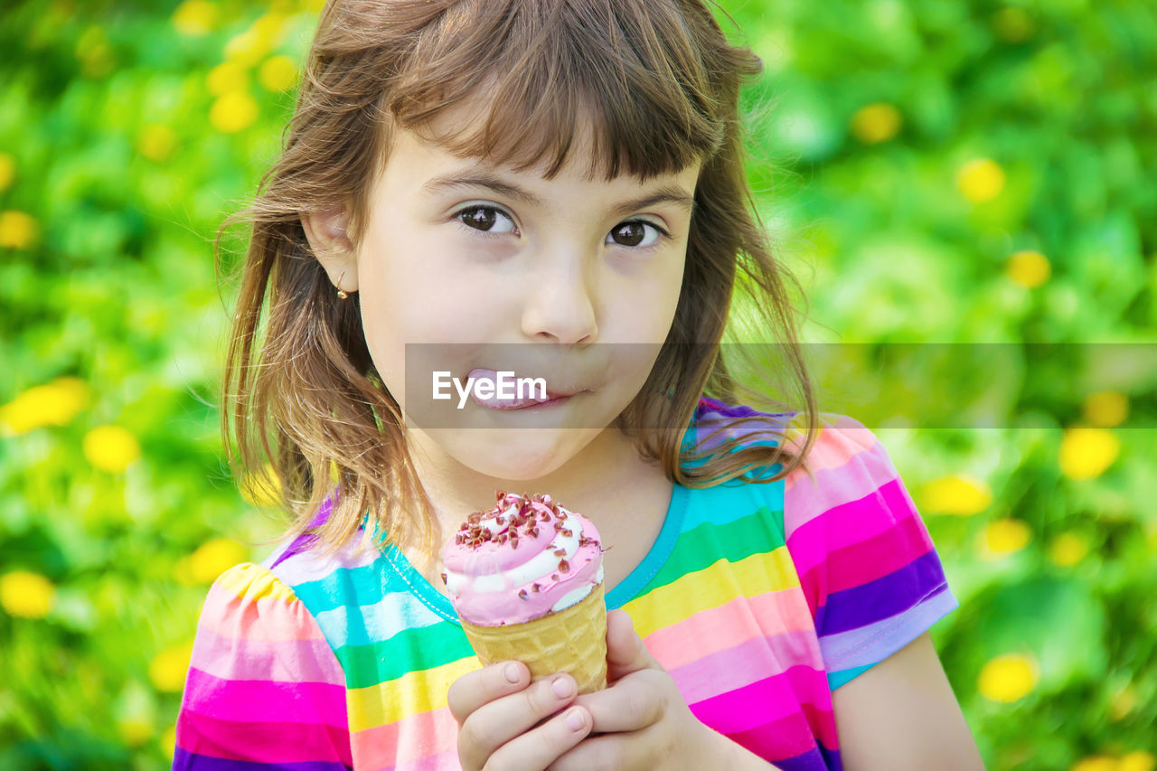 child, childhood, portrait, one person, women, female, smiling, toddler, cute, looking at camera, happiness, summer, emotion, person, food, food and drink, portrait photography, innocence, sweet food, headshot, nature, front view, flower, sweet, holding, brown hair, hairstyle, cheerful, human face, freshness, fun, multi colored, plant, outdoors, casual clothing, enjoyment, grass, day, lifestyles, joy, brown eyes, positive emotion