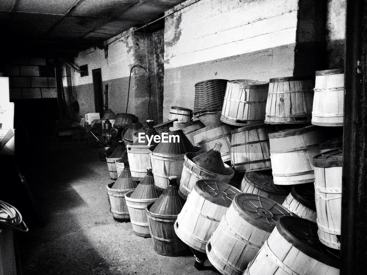 Stack of wine barrels in cellar
