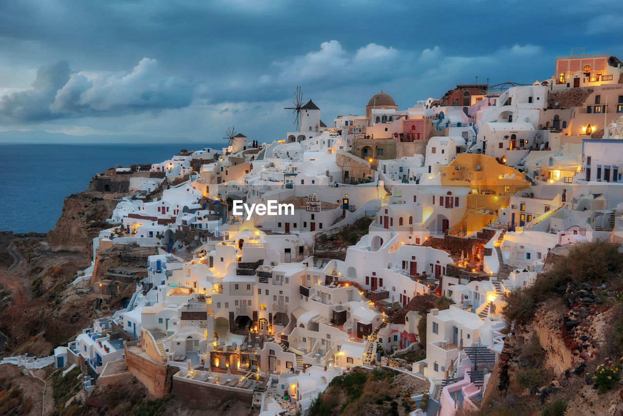 High angle view of town by sea