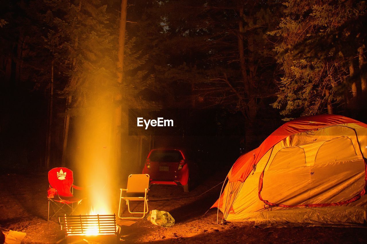 Illuminated tent at night