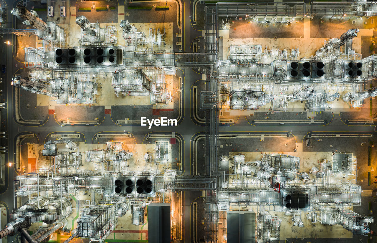 FULL FRAME SHOT OF ILLUMINATED GLASS WINDOW IN CITY