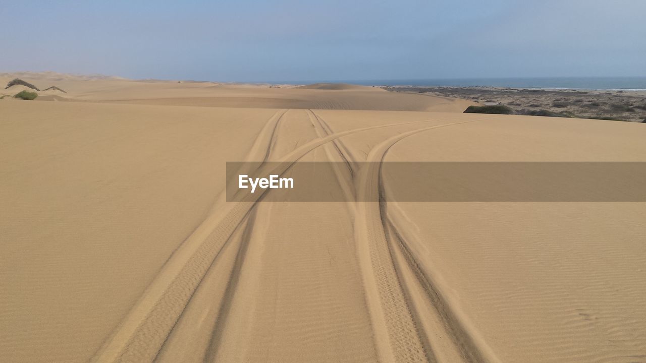 Scenic view of desert against sky