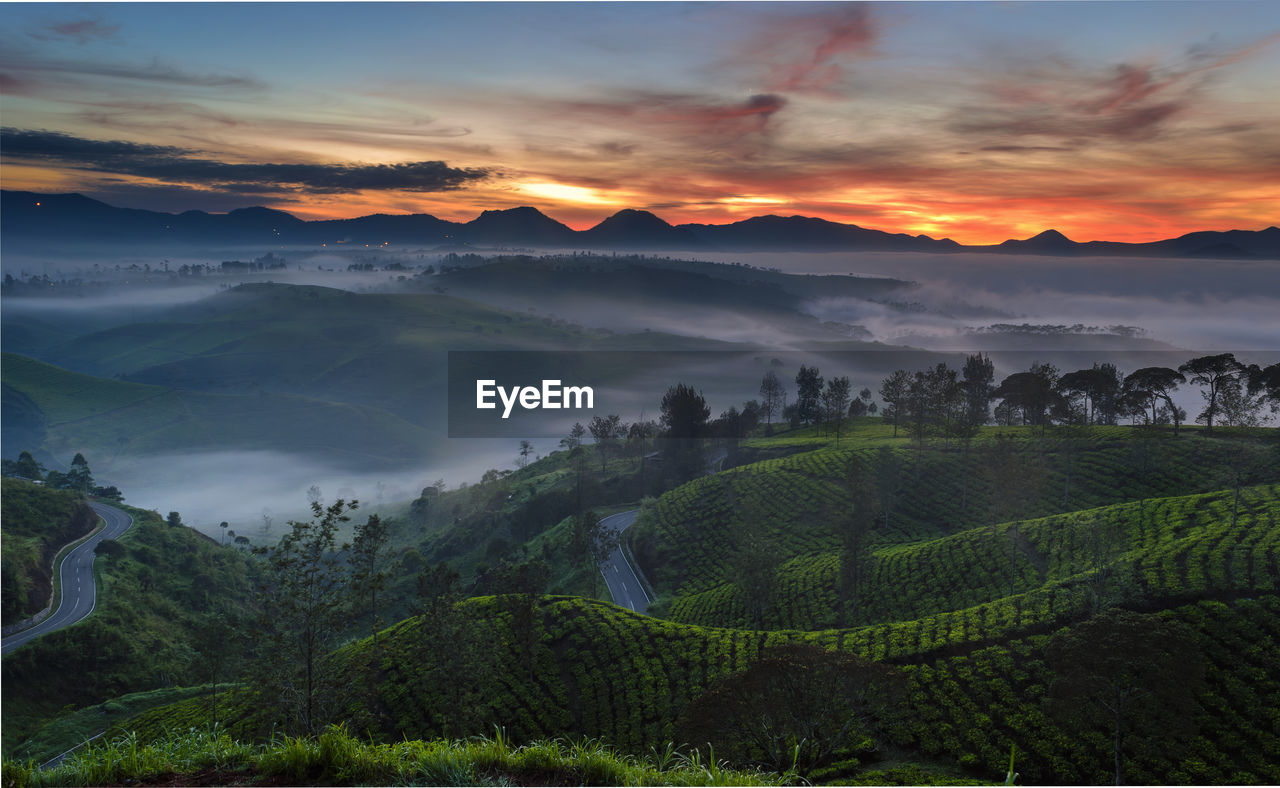 Scenic view of landscape against sky during sunset