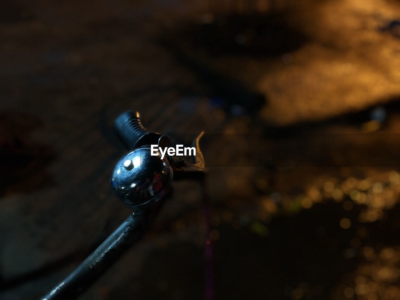 HIGH ANGLE VIEW OF OLD LIGHT BULB AT NIGHT