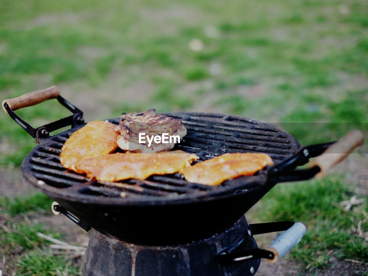 Meat preparing on barbecue grill