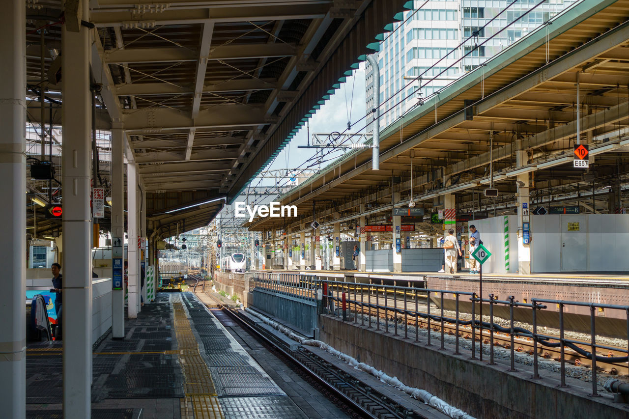 RAILROAD TRACKS AT STATION