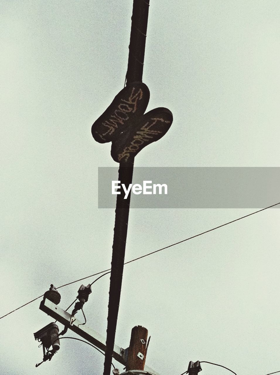 LOW ANGLE VIEW OF POWER LINES AGAINST SKY