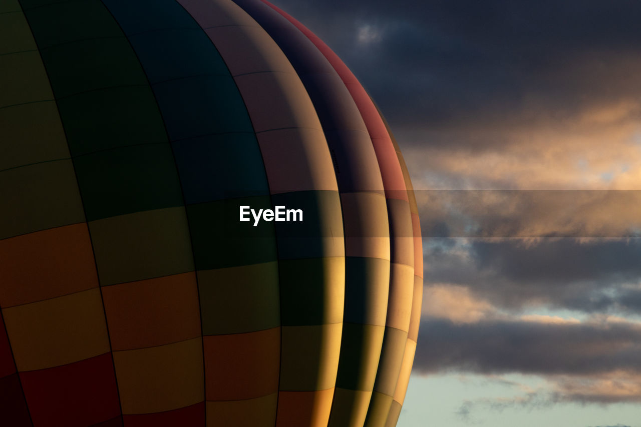 Low angle view of hot air balloon against sky during sunset