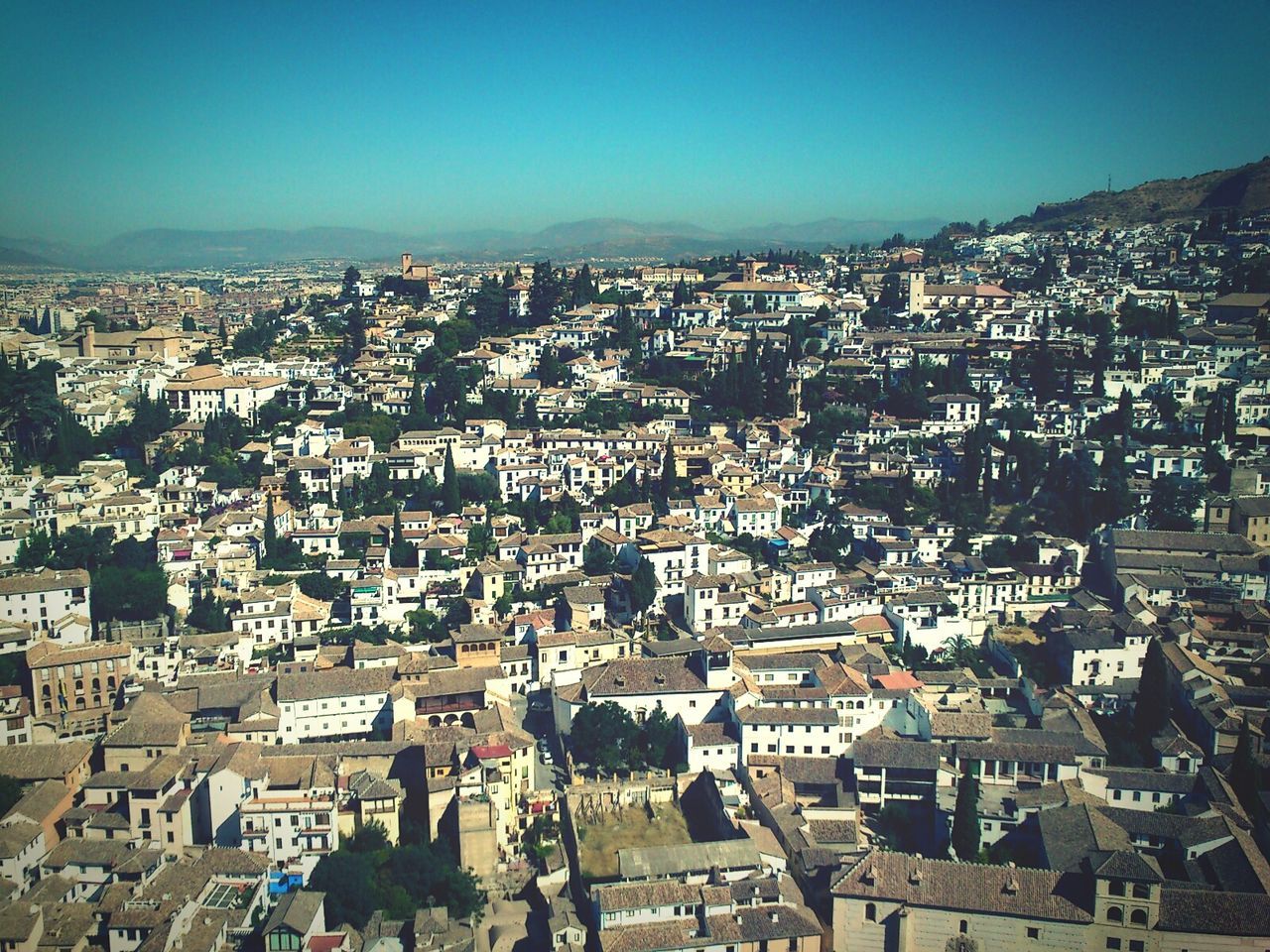 AERIAL VIEW OF CITY AGAINST SKY