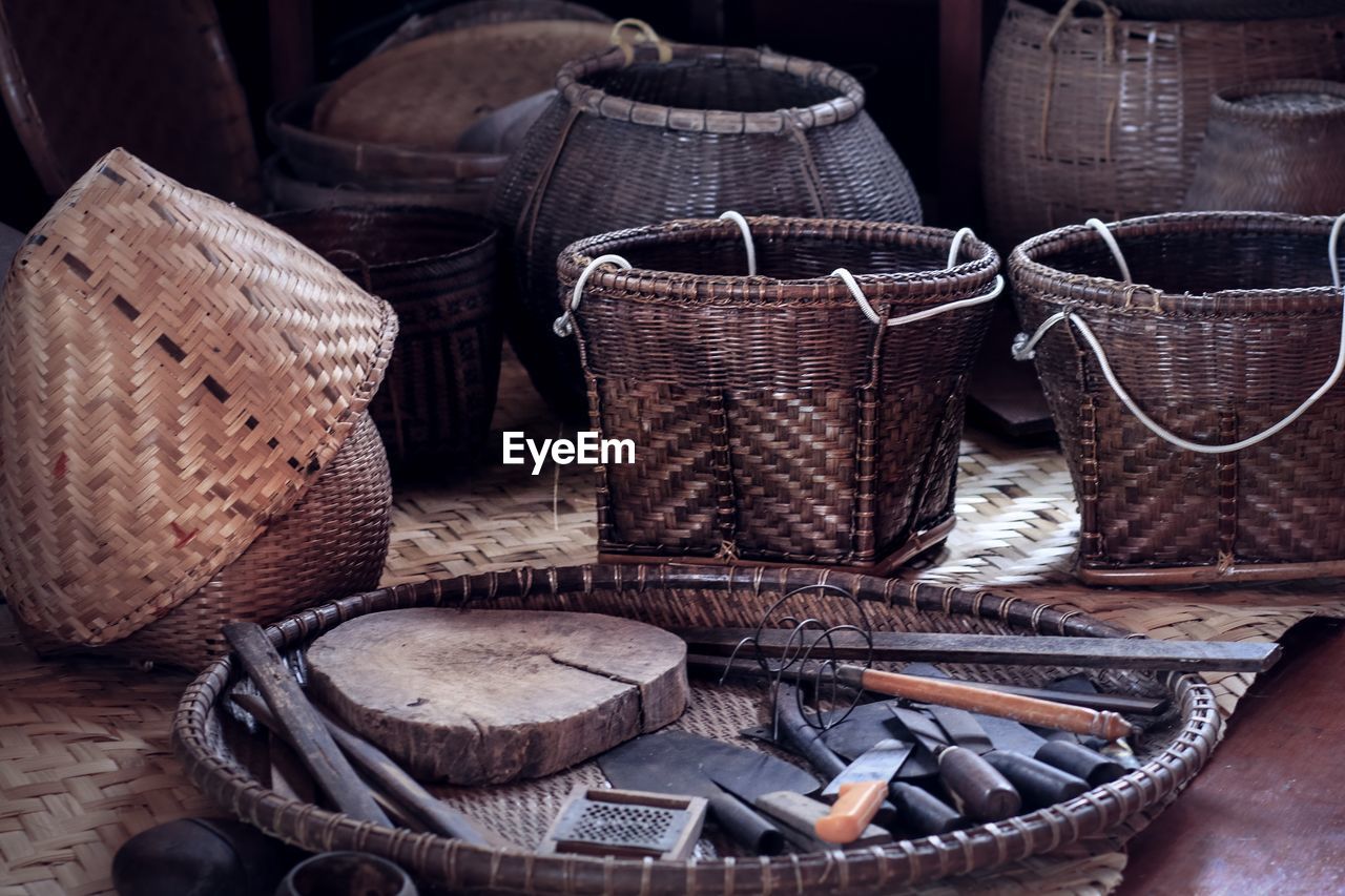 High angle view of knives in basket at market stall