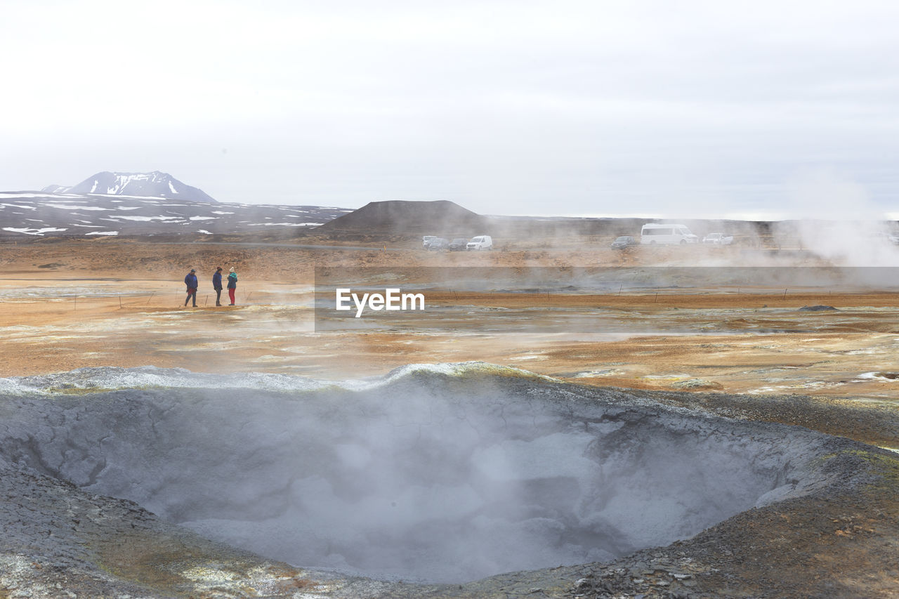 Landscape of namafjall hverir sulfuric area and tourists