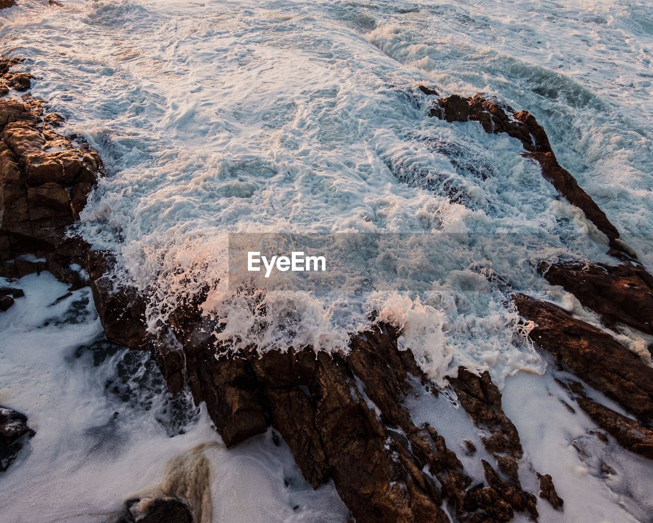 High angle view of sea shore during winter