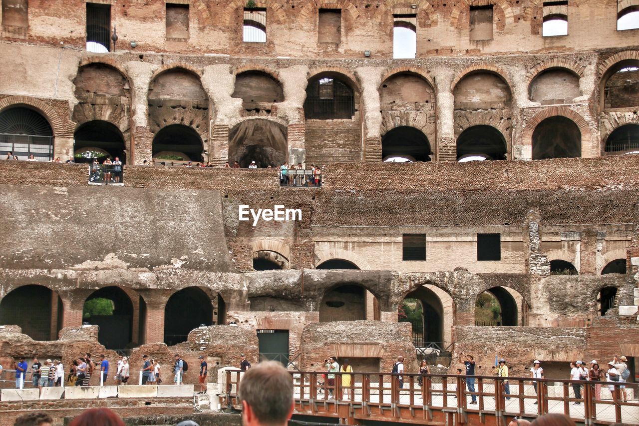 GROUP OF PEOPLE IN OLD TOWN SQUARE