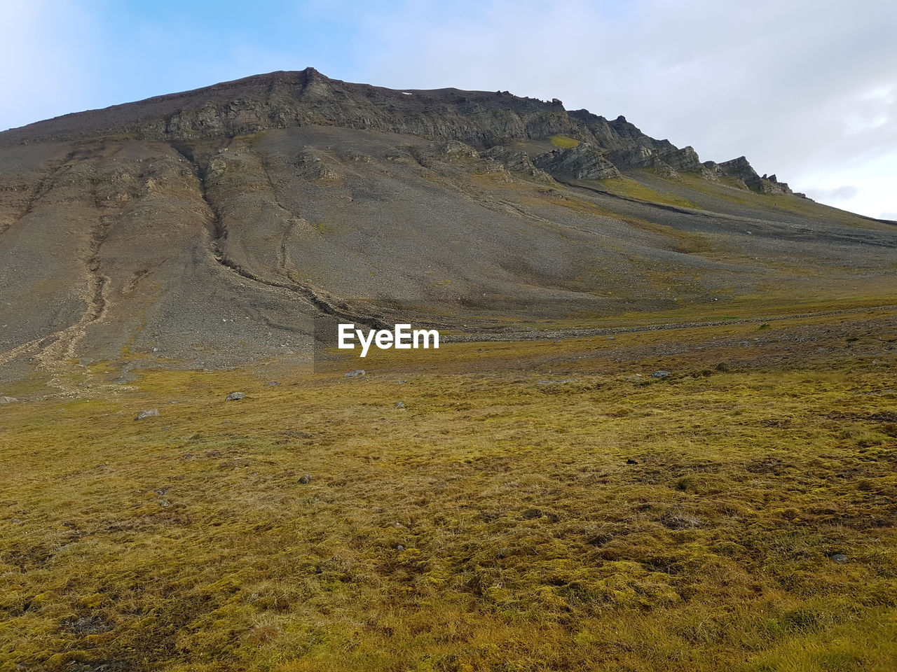 Scenic view of mountain range against sky