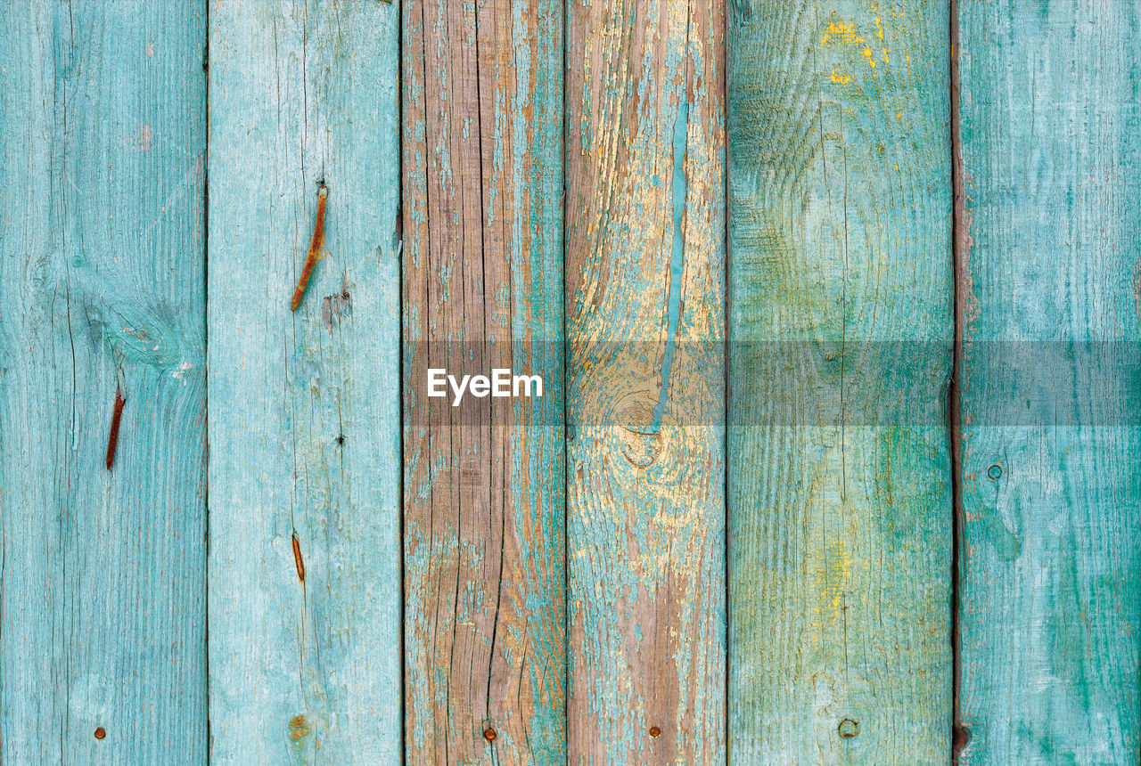 wood, blue, backgrounds, green, full frame, pattern, textured, no people, weathered, plank, old, close-up, wall, floor, wall - building feature, rough, day, wood grain, damaged, azure, striped, outdoors, rundown, line, turquoise, hardwood, built structure, fence