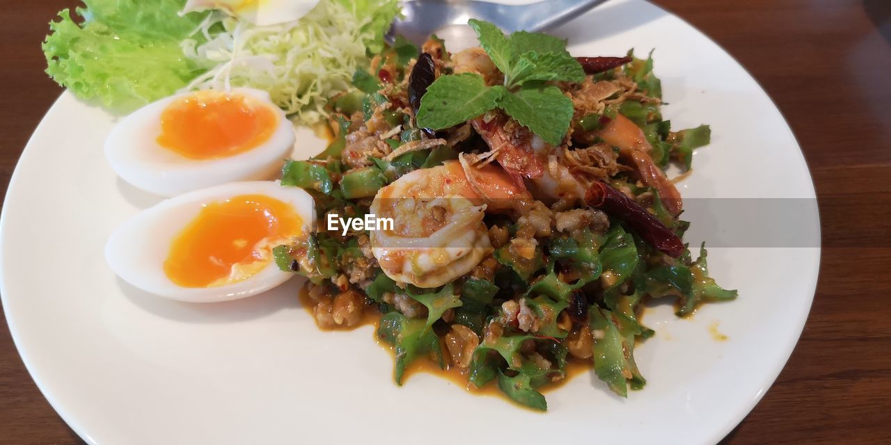 food and drink, food, healthy eating, plate, wellbeing, egg, freshness, meal, table, salad, dish, vegetable, cuisine, fried, no people, indoors, serving size, high angle view, meat, fried egg, close-up, lunch, restaurant, egg yolk, still life, produce, asian food, business