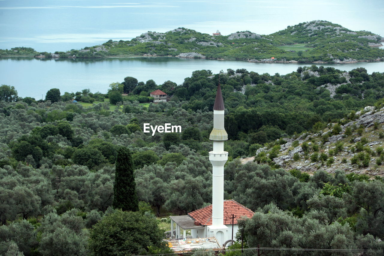 High angle view of religious building surrounded by trees