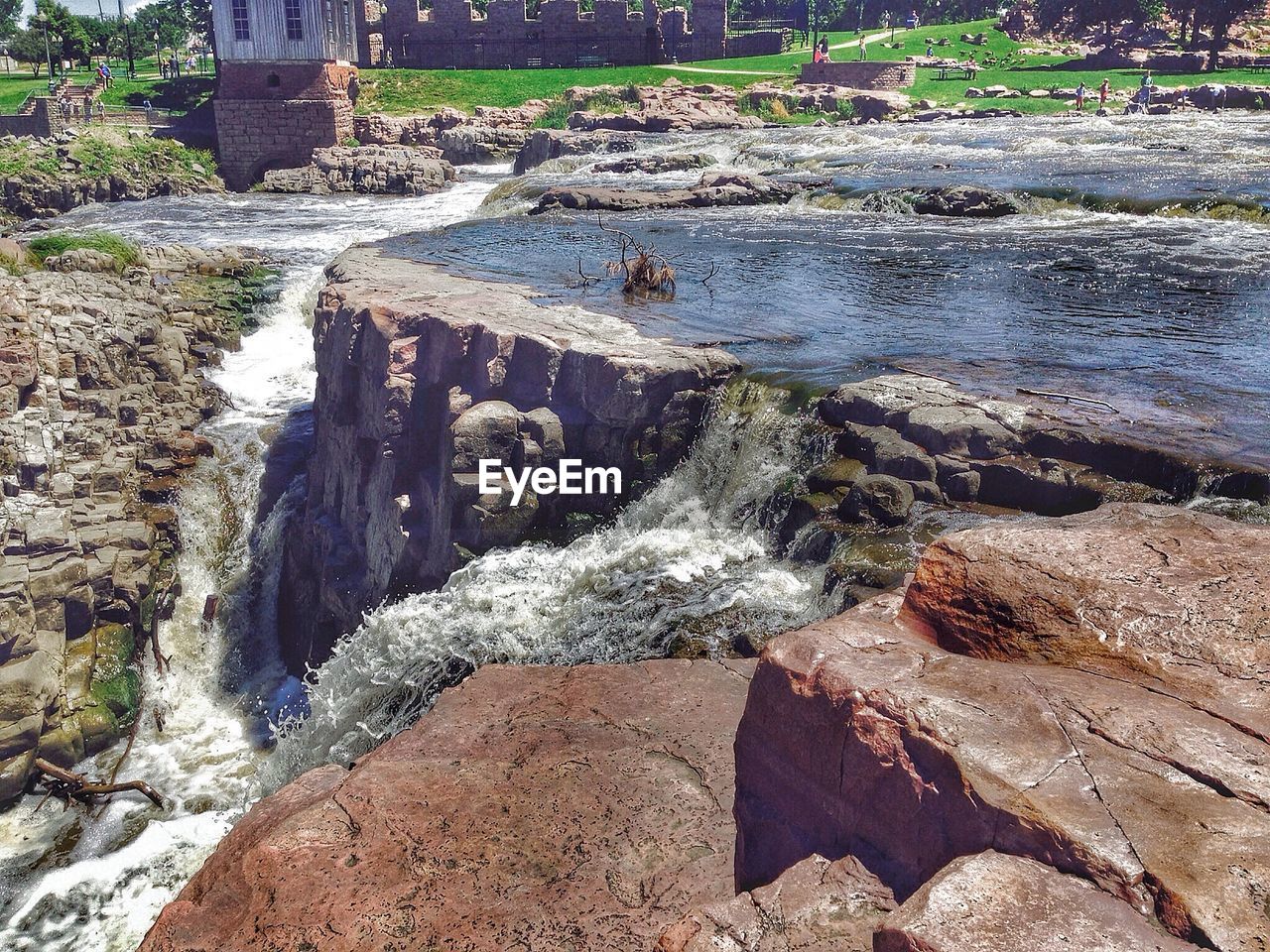 High angle view of water flowing through rocks