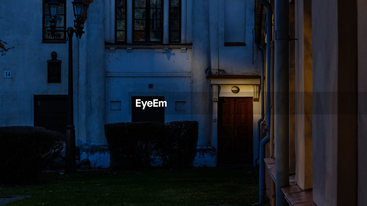 Entrance of old building at night