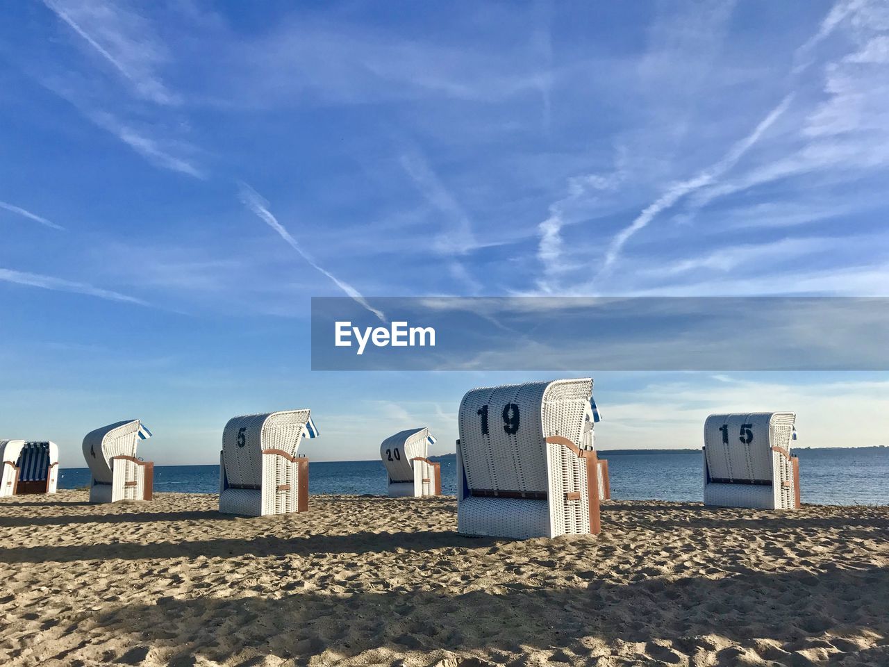 SCENIC VIEW OF BEACH BY SEA AGAINST SKY