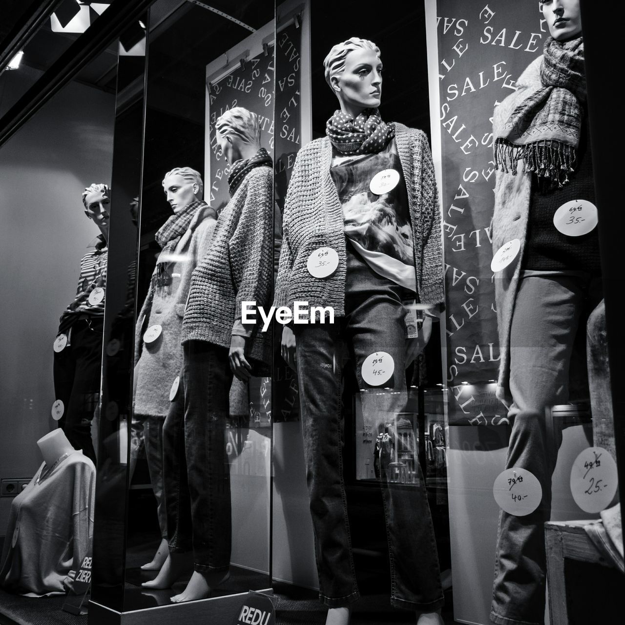 Mannequins with clothes at shop