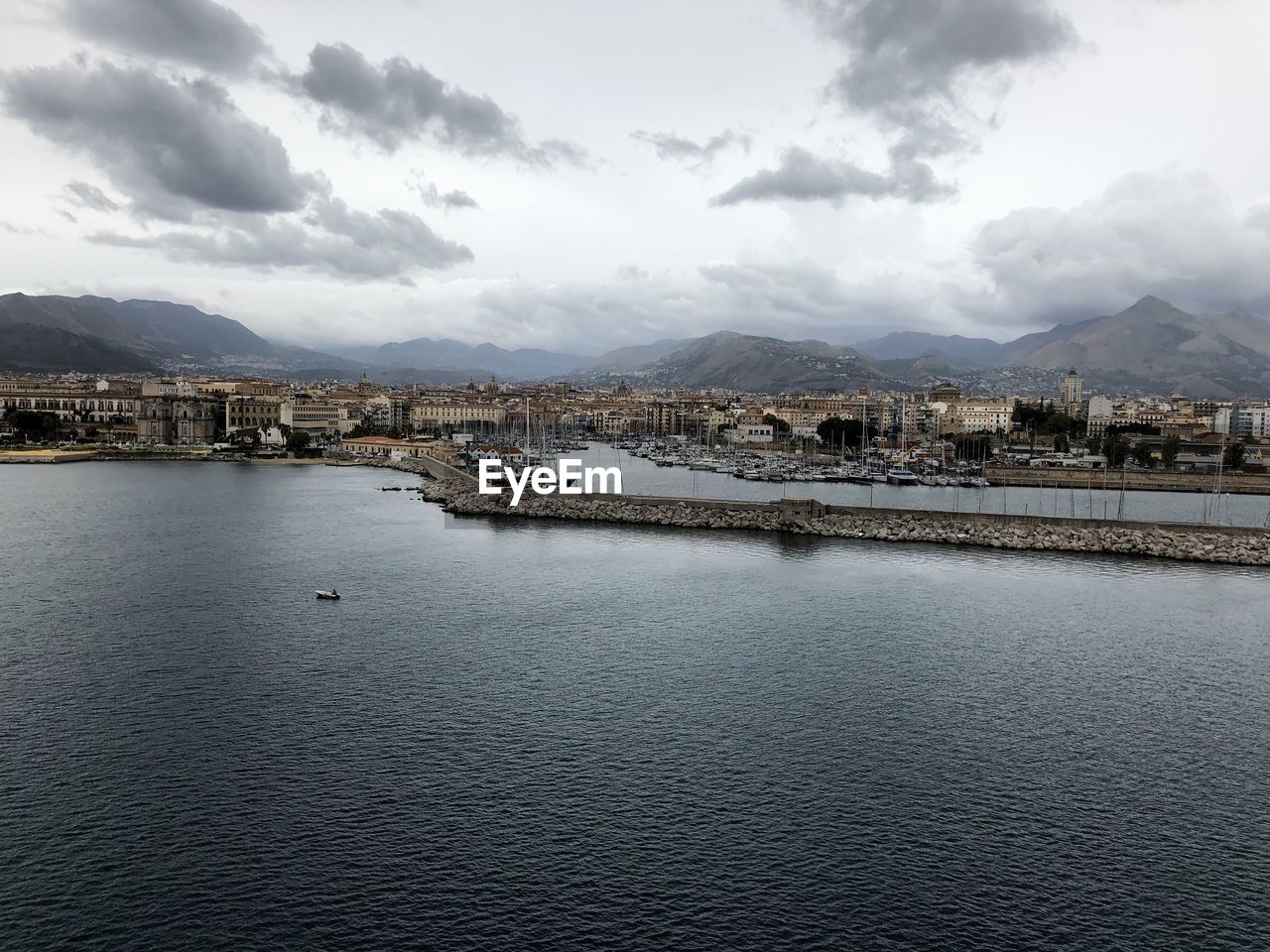 CITY BY SEA AGAINST SKY