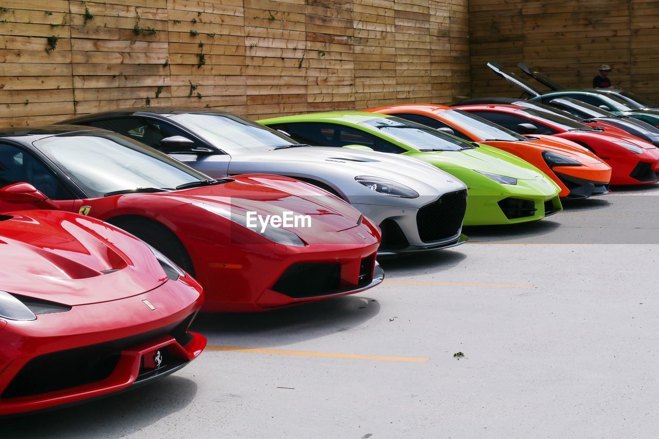 VIEW OF MULTI COLORED CARS IN STREET