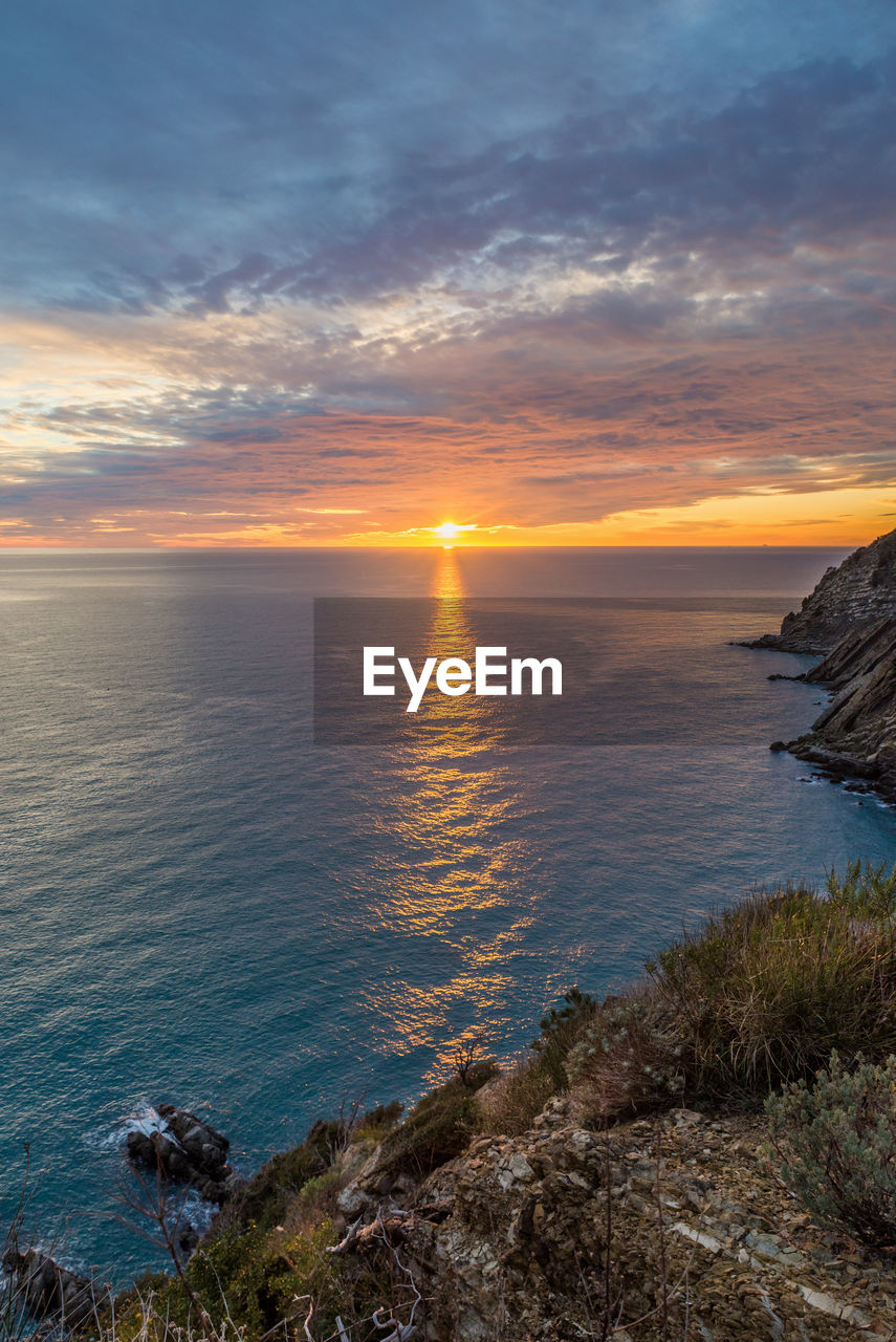 Scenic view of sea against sky during sunset