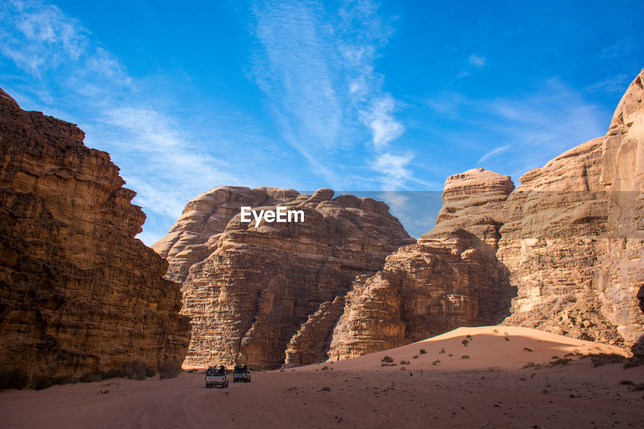 Panoramic view of rock formations against sky