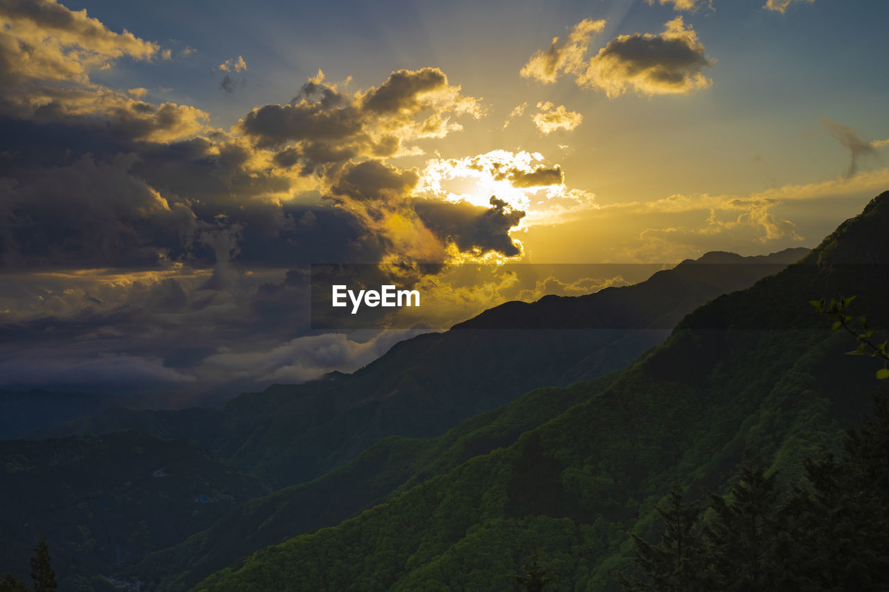 Scenic view of dramatic sky during sunset