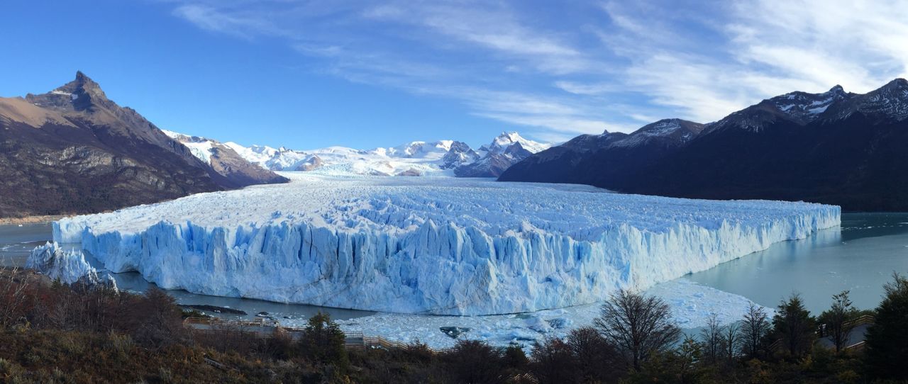 Scenic view of perito moreno glacier and mountains against sky