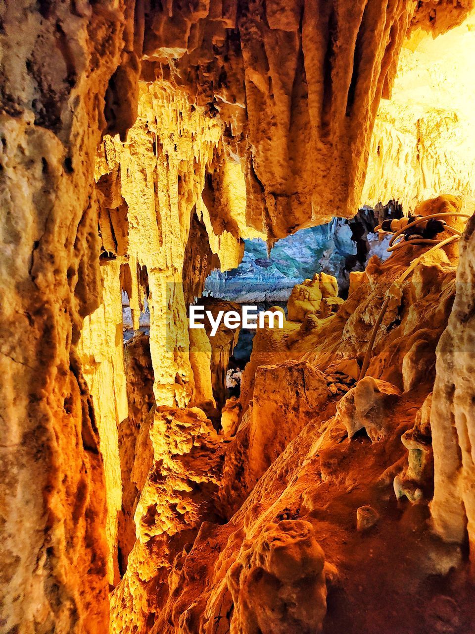 rock, rock formation, cave, formation, nature, geology, caving, physical geography, stalagmite, adventure, day, one person, outdoors, beauty in nature, non-urban scene, stalactite, men, full length, leisure activity, travel, travel destinations, eroded