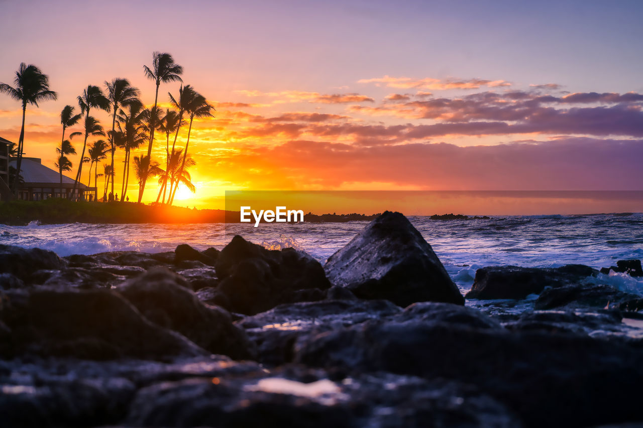 Scenic view of sea against sky during sunset