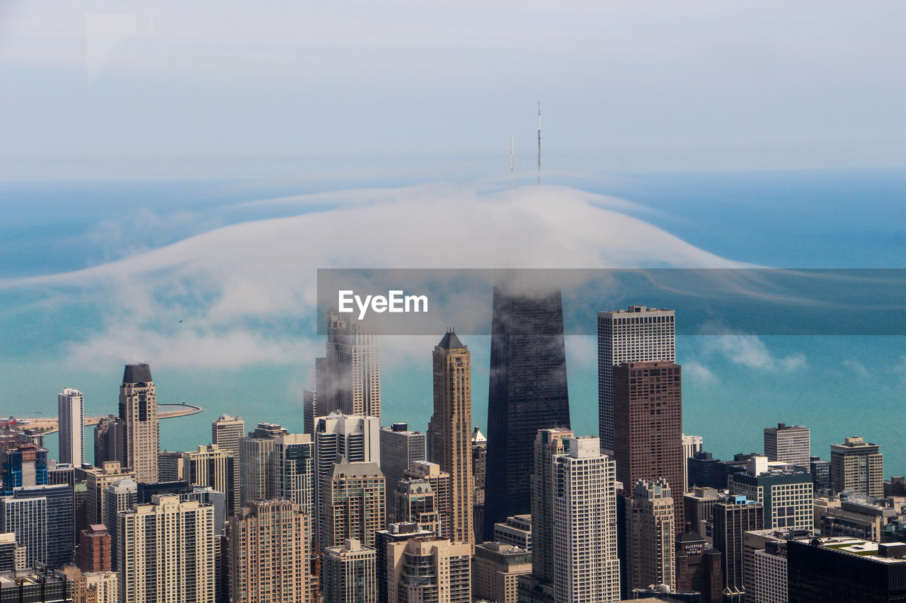 Aerial view of cityscape against sky in chicago 
