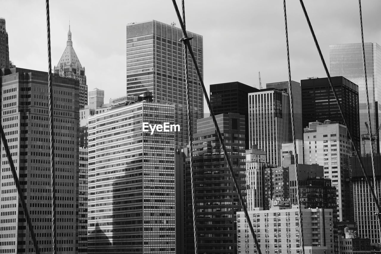 Low angle view of buildings in city against sky