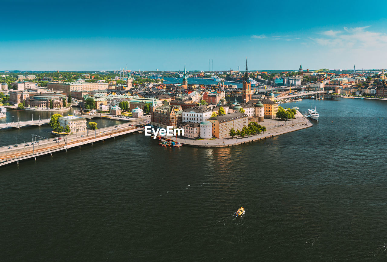 high angle view of boats in river against sky