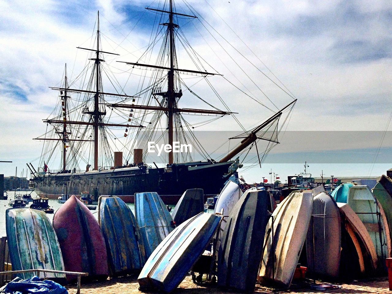 Boats moored at harbor