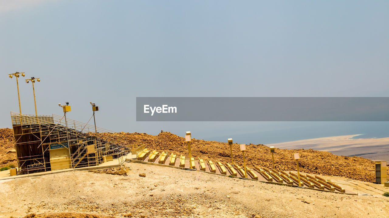 LOW ANGLE VIEW OF BEACH AGAINST SKY