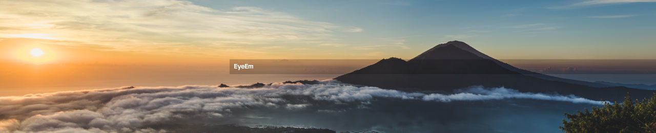 Scenic view of dramatic sky during sunset