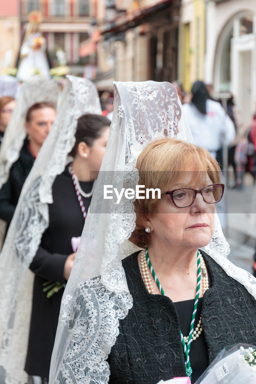 WOMAN LOOKING AT CAMERA