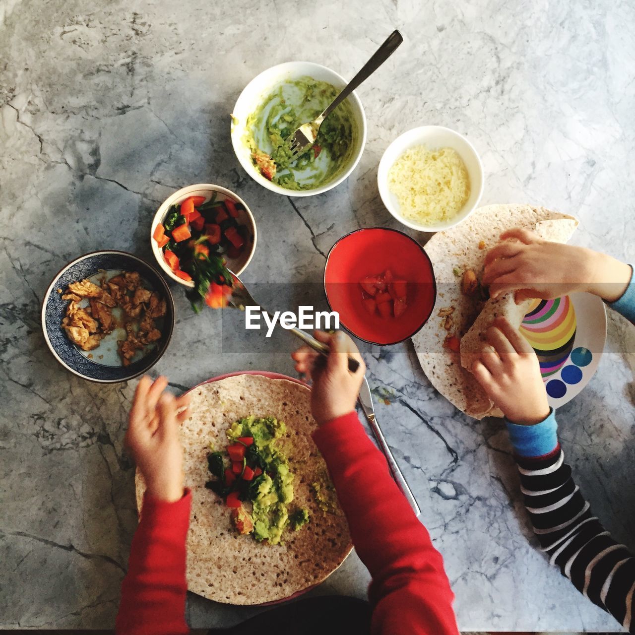 High angle view of people having meal at table