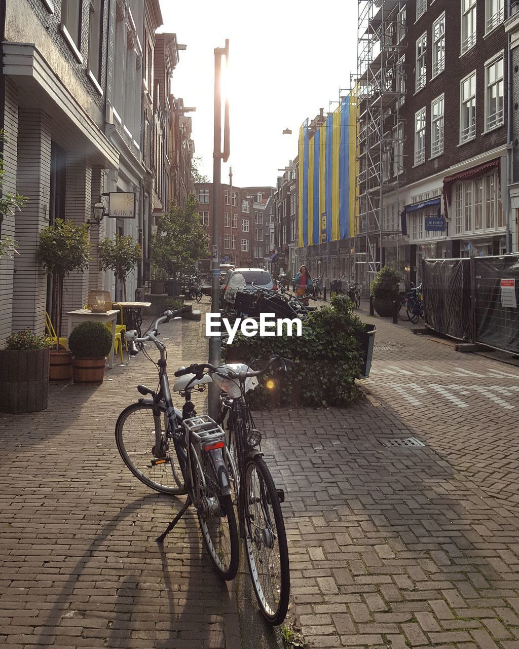 Bicycles parked on footpath