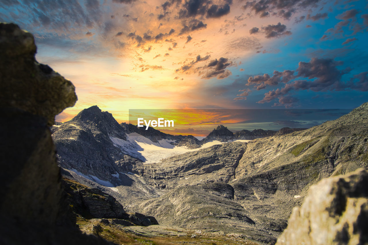 Sunset in the mountains in austria scenic view of mountains against sky during sunset 