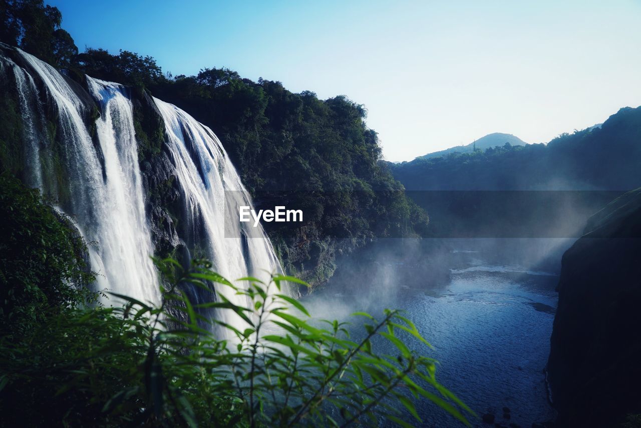 SCENIC VIEW OF WATERFALL