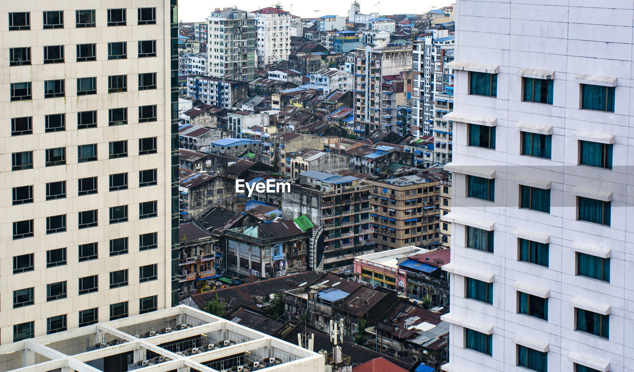 High angle view of modern buildings in city