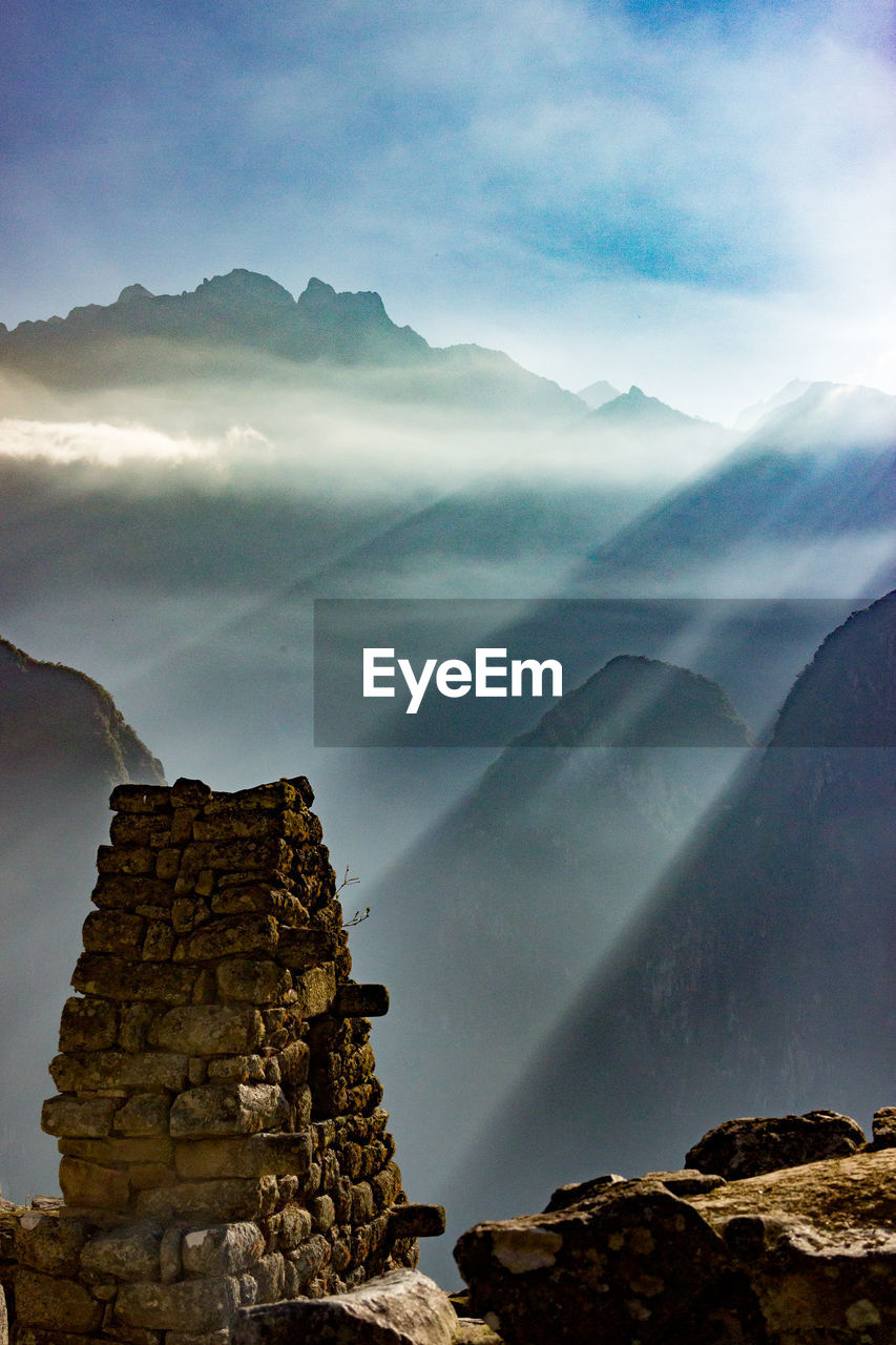 VIEW OF MOUNTAIN RANGE AGAINST SKY