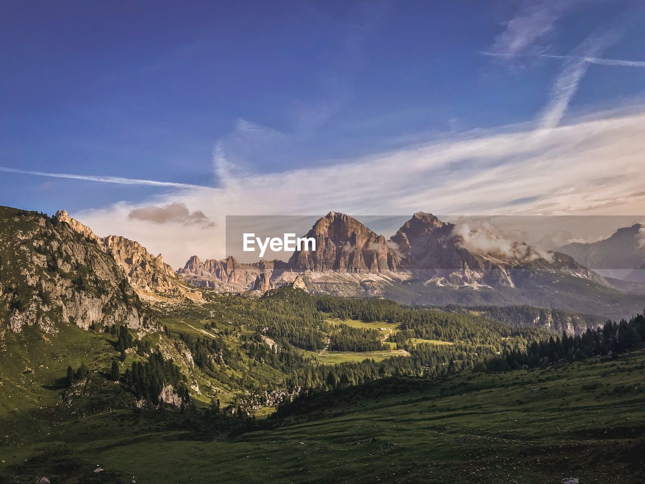 Scenic view of landscape and mountains against sky