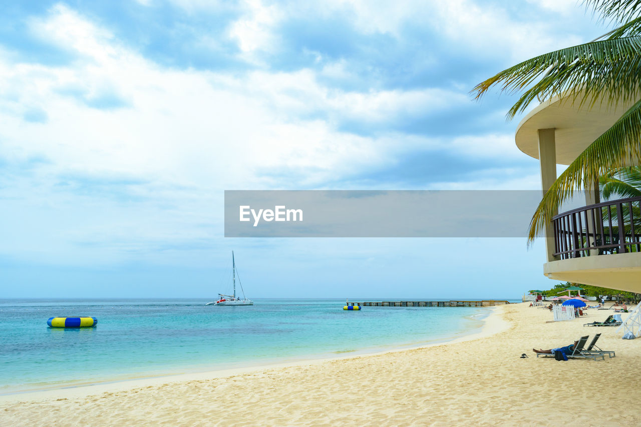 Scenic view of beach against sky